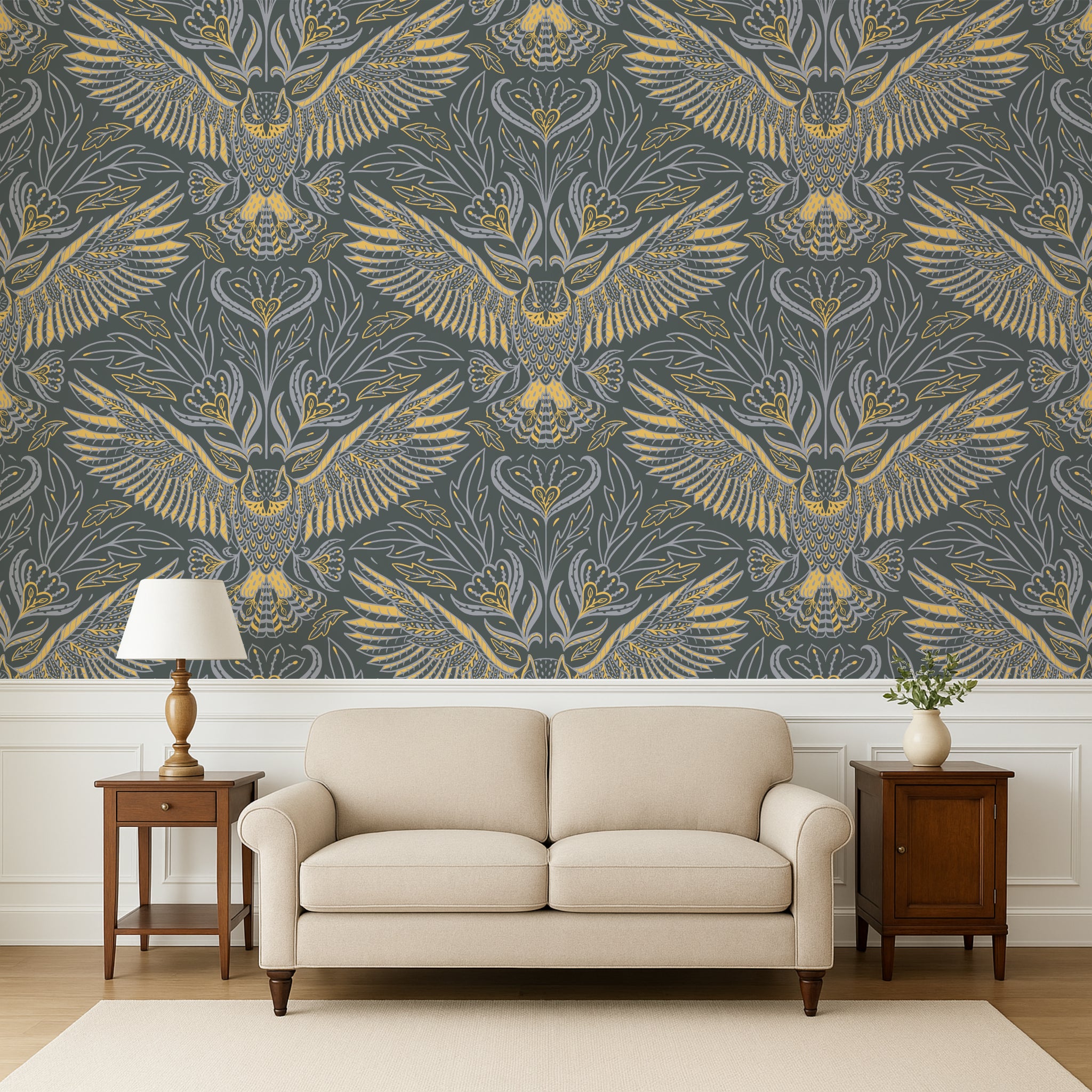 Living room with a beige sofa, wooden side tables, and a wall featuring a gold and gray patterned wallpaper.